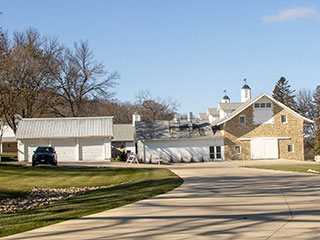 A look at a house yard with a big garage